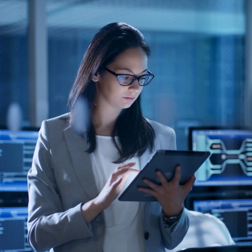 woman holding an ipad 